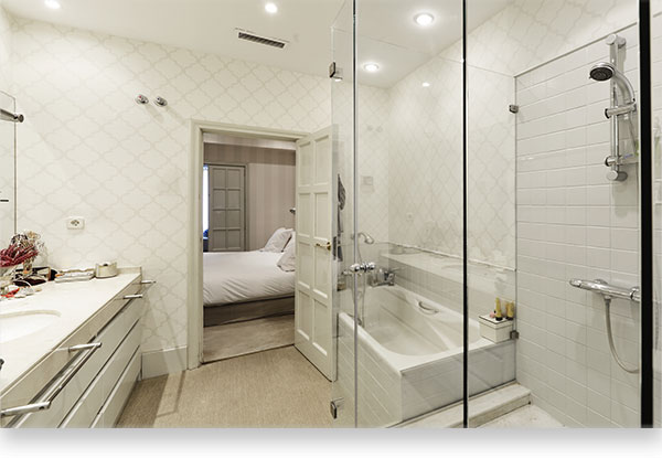 photo of super clean white master bathroom